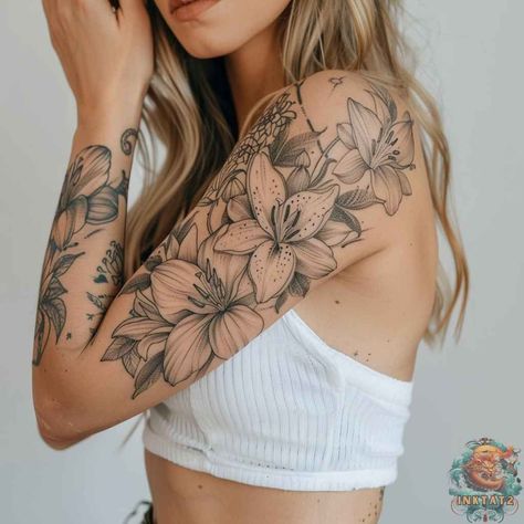 From Fragile Beauty to Powerful Symbol: The Fascinating History of Lily Tattoos: 114 Designs - inktat2.com Flower Piece Tattoo Arm, Waterlily Sleeve Tattoos, Water Lily Arm Tattoo, Lilly Sleeve Tattoos For Women, Lilly Sleeve Tattoo, Unique Quarter Sleeve Tattoos For Women, Upper Arm Shoulder Tattoos For Women, Tiger Lilies Tattoo, Water Lily Tattoo Sleeve