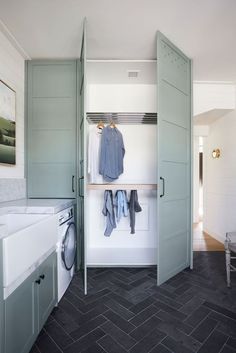 Sage green and marble laundry oozing modern farmhouse vibes Laundry Designs, Drying Cupboard, Laundry Cupboard, Utility Room Designs, Airing Cupboard, Green Laundry, Drying Room, Dream Laundry Room, Mudroom Laundry Room