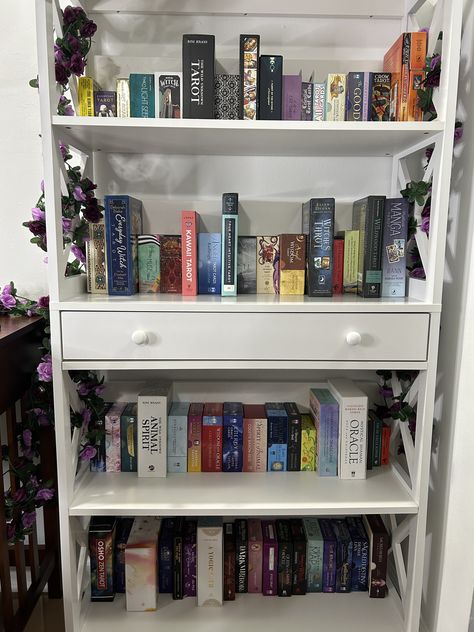 Bookcase with tarot and oracle cards Tarot Card Reader Aesthetic, Black Tarot Reader, Oracle Card Decks, Tarot Reading With Regular Card Deck, Professional Tarot Reader, Tarot Reader, Card Collection, Tarot Readers, Deck Of Cards