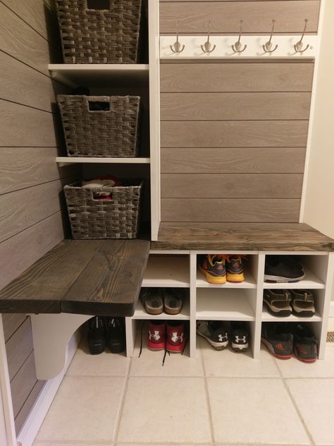 Corner mudroom storage with baskets & shoe cubbies Small Mudroom Shoe Storage, Small Corner Mudroom Bench, Small Corner Mudroom Ideas Entryway, Small Mud Room With Laundry, Corner Mudroom Bench With Shoe Storage, Mud Room Basket Storage, Entry Way Cubbies Corner, Corner Mudroom Ideas Entryway, Corner Mudroom Storage