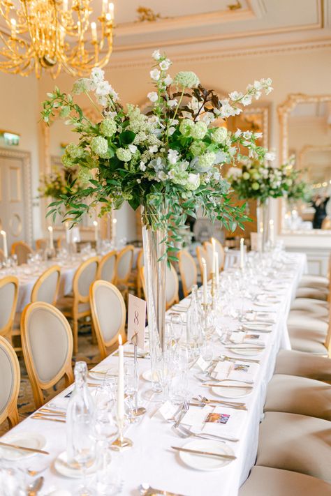 Greenery Tall Centerpiece Wedding, Tall Glass Vase Arrangements, Tall Table Arrangements Wedding, Tall Candle Centerpieces Wedding Round Table, Elevated Wedding Centerpieces, Tall Cylinder Vase Centerpiece, Tall Floral Centerpieces Wedding, Elevated Floral Centerpieces, Tall Glass Vase Centerpiece