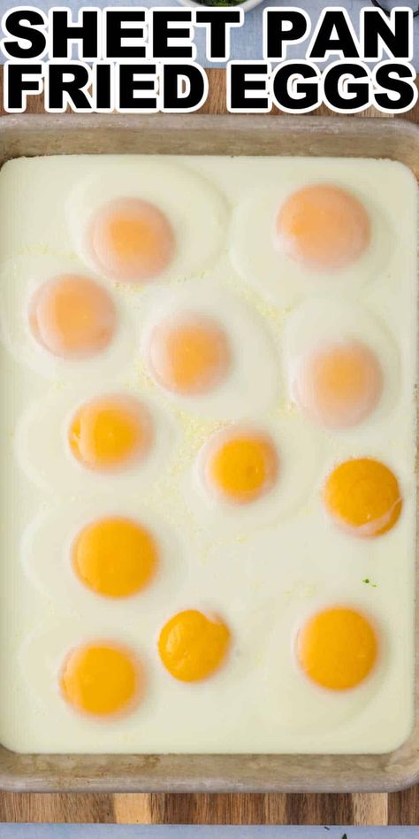 This Sheet Pan Fried Eggs Recipe (Sheet pan sunny side up eggs) is the perfect easy way to make a large batch of sunny side up (also known as fried eggs). Making sheet pan fried eggs makes meal prep and making breakfast or brunch for a crowd super easy. Eggs On A Cookie Sheet, Sunny Side Up Eggs In Oven, Make Ahead Fried Eggs, Oven Baked Eggs Sheet Pan, Sheet Pan Fried Eggs, Fried Eggs For A Crowd, Oven Fried Eggs, Oven Eggs Sheet Pan, Fried Eggs In The Oven