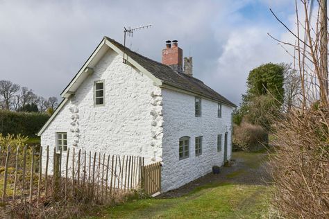 The cottage, which is said to have been built in 7 Modern Kitchen Extensions, Farmhouse Outside, California Cottage, Inset Fireplace, Welsh Cottage, Welsh Countryside, Cottage Modern, Houses In France, Reclaimed Doors