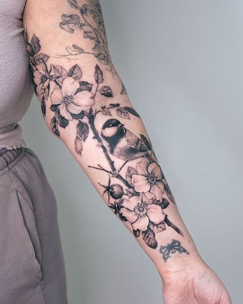 Ola | tattoo artist on Instagram: "Thank you Sydney! #rosetattoo #floraltattoo #chickadee Done with @emalla.official @cheyenne_tattooequipment @nocturnaltattooink @saniderm" Bird And Flower Tattoo Forearm, Chickadee Drawing Tattoo Ideas, Flowers And Birds Tattoo, Robin Tattoo Black And White, Flower Bird Tattoo, Nightingale Tattoo, Thomas Tattoo, Chickadee Tattoo, Half Arm Sleeve Tattoo