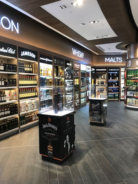 Wine Shop Interior Design Liquor Store, Whisky Store, Wine Store Design, Wine Shop Interior, Duty Free Store, Supermarket Design Interior, Store Shelves Design, Whisky Shop, Opening A Coffee Shop