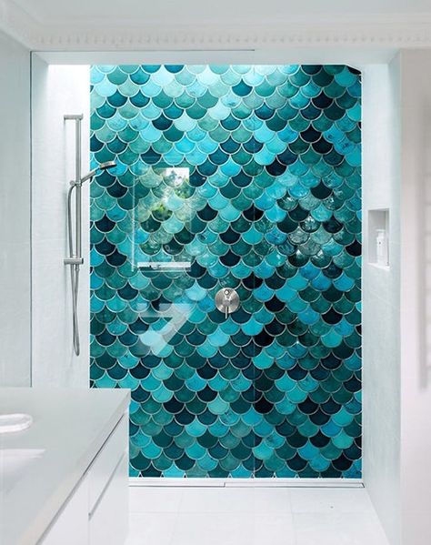 Paging Ariel: Mermaid Tiles Are So In Right Now  via @PureWow Bathroom Ideas Mermaid Tiles, Bathroom Floor And Wall Tile Ideas, Mermaid Tile Bathroom, Fish Scale Tile Bathroom, Mermaid Tiles, Mermaid Tile, Moroccan Fish Scale, Teal Bathroom, Fish Scale Tile