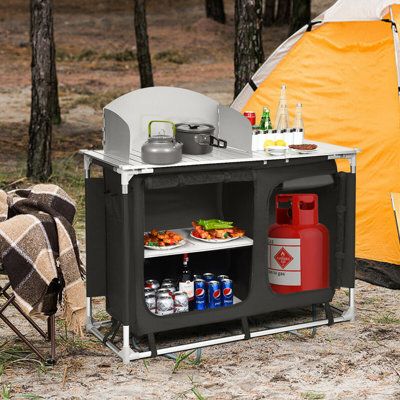 The removable basin on the side facilitates outdoor washing. Made of high-quality steel frames and Oxford fibres, the kitchen countertop is rugged and suitable for outdoor use. All parts are packed in handbags and are ideal for outdoor activities such as camping in the wild and spring outings. With a detailed user manual, there will be no difficulty in assembling the barbecue table. Portable Camp Kitchen, Sink Table, Table Grill, Barbecue Portable, Outdoor Camping Kitchen, Grill Table, Portable Barbecue, Portable Bbq, Portable Grill