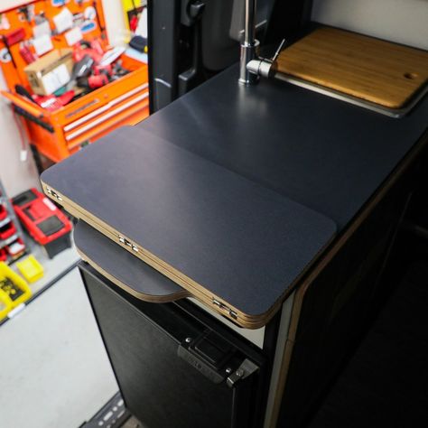 We now offer our Countertop Extension in the stock Revel Laminate!⁠ ⁠ Not only does it extend your galley countertop, it's now made out of 5 layers of Baltic Birch to ensure that it never warps, never cracks and lasts for years with 0 maintenance. We still use the same, high quality, marine grade hinges to ensure they never rust and your countertop extension works flawlessly for years to come. The bottle opener on the bottom is just a fun bonus.⁠ ⁠ There's an easy to follow install video on o... Folding Countertop, Countertop Extension, Sprinter Passenger Van, Taking Up Space, Garage Storage Systems, Set It Up, Bike Storage, Counter Space, Interior Floor