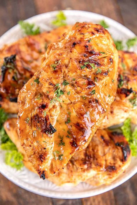 Maple Mustard Grilled Chicken - so simple! Only 6 ingredients - chicken, maple, dijon mustard, lemon juice, paprika, and salt. Let the chicken marinate in the fridge and then grill or cook on the stove. We LOVE this easy chicken. The maple mustard sauce is to-die-for delicious! My husband asks me to make this at least once a week - SO good! #marinade #chicken #grilled #glutenfree Maple Mustard Sauce, Mustard Marinade For Chicken, Dijon Mustard Chicken, Maple Dijon Chicken, Chicken Marinate, Marinade Chicken, Maple Chicken, Chicken Protein, Chicken Grilled