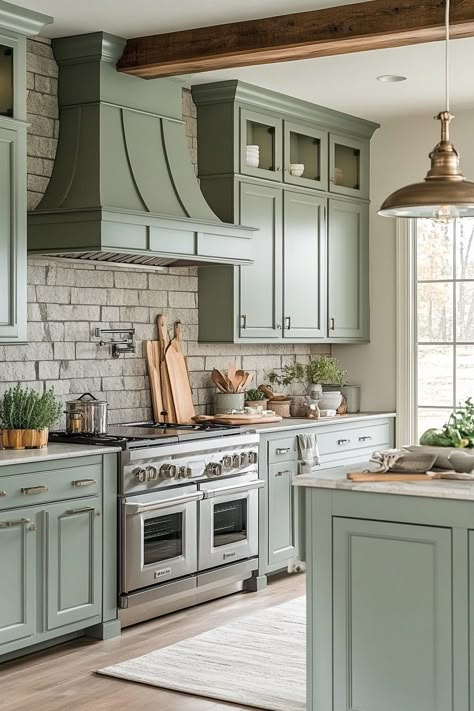 29 Kitchen Cabinet Color Ideas to Add Personality to Your Kitchen White And Sage Green Kitchen, Sage Cabinets Kitchen, Sage Green And Wood Kitchen, Sage Green Kitchen Walls, Sage Green Kitchen Ideas, Sage Green Kitchens, Peaceful Kitchen, Green Kitchen Walls, Earthy Kitchen