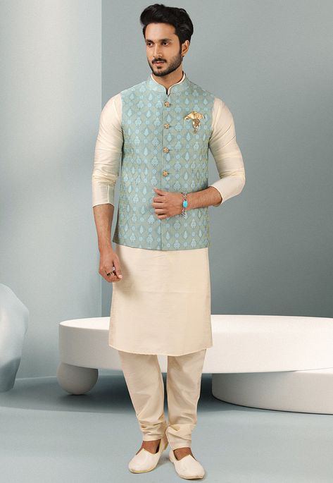 Art Silk Kurta in Off White This Readymade attire is Enhanced with Buttons, has Pockets and is Crafted in Chinese Collar Neck and Full Sleeve Available with an Art Silk Churidar in Off White and an Art Silk Jacquard Nehru Jacket in Sky Blue Do note: Footwear shown in the image is for presentation purposes only. Half to one inch may vary in measurement. (Slight variation in actual color vs. image is possible) Traditional Indian Mens Clothing, Indian Wedding Suits Men, Mens Traditional Wear, Indian Wedding Clothes For Men, Nehru Jacket For Men, Waistcoat Designs, Wedding Kurta For Men, Boys Kurta Design, Groom Dress Men