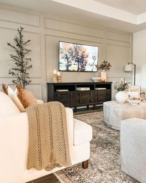 Living Room With Media Console, Traditional Living Room Tv Wall, Tvs In Living Rooms, Large Wall Around Tv Decor, Wainscoting Around Tv, Transitional Accent Walls, Havertys Living Room, Living Room Large Accent Wall, Transitional Family Room With Tv