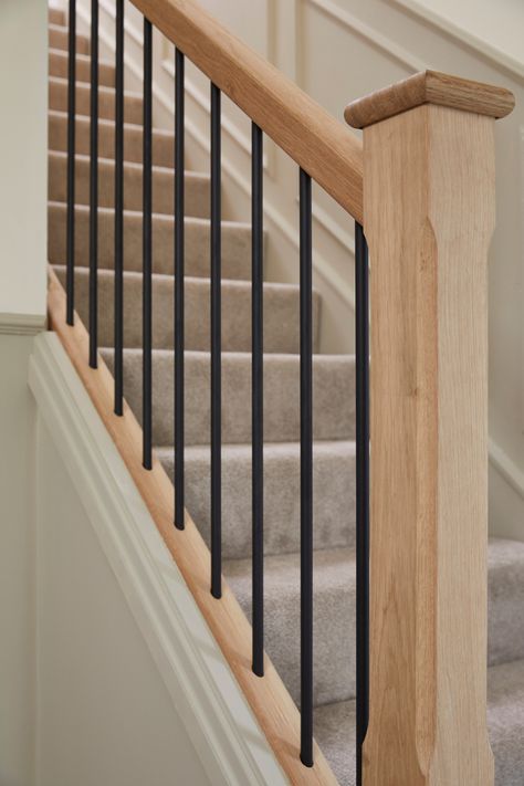 Howdens Staircase, Staircase Bannister Ideas, Black Wooden Spindles Staircase, Staircase Metal Spindles, Stair Spindle Makeover, Stairs With Metal Spindles, Modern Railings For Stairs, Shaker Staircase, Old Staircase Makeover