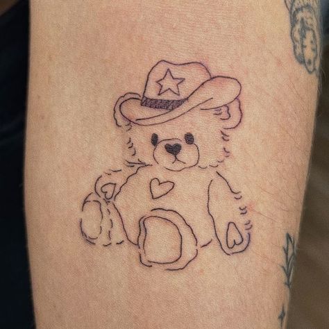 https://instagram.com/emmakashif?igshid=MjkzY2Y1YTY= Teddy Bear Drawing Tattoo, Cowboy Teddy Bear Tattoo, Teddy Bear Tattoo Aesthetic, Bear Tattoo Aesthetic, Stuffed Animal Tattoo Simple, Bear Tattoos Cute, Sweethearts Tattoo, Childhood Stuffed Animal Tattoo, Tattoo Ideas Bear