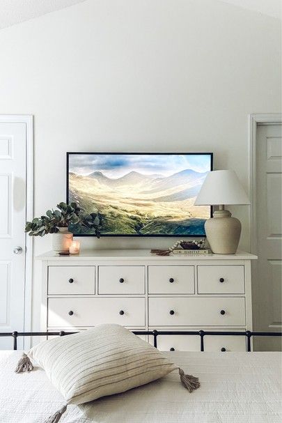 White Bedroom Tv Wall, Bedroom Decor Under Tv, Bedroom With Tv Stand, White Dresser In Living Room, White Dresser Decor With Tv, Bedroom Ideas With Tv On Dresser, Bed With Dressers On Each Side, Bedroom Dresser Under Tv Decor, Bedroom Tv Storage Ideas