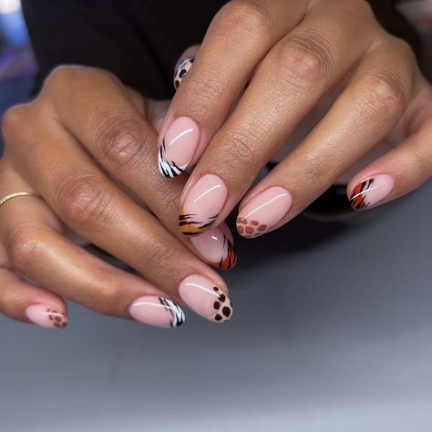 Animal print frenchies 🦓 On a short almond with all neutral tones 🤎 #nailart #naturalnails #naturallongnails #gelnails #bayareanails #groovynails #nailinspo Short Almond Cheetah Nails, Animal Print Tip Nails, Zebra Nail Art Designs, Short Animal Print Nails, Safari Themed Nails, Safari Theme Nails, Animal Print French Tip Nails, Almond Nail Short, Safari Nails Designs