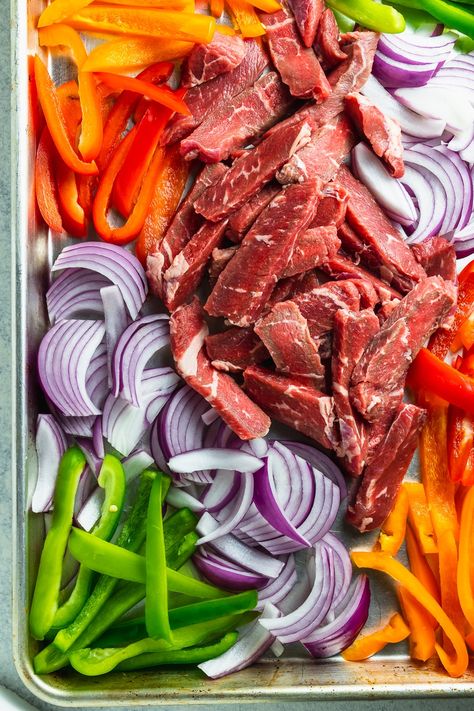 Sheet pan steak fajitas are the weeknight dish that make weeknights a blast! Easy to make, fun to eat, and full of flavor - grab this delicious, fast, and healthy dinner recipe at joeats.net. #joeats #steak #fajitas #sheetpandinner #weeknightdinner Fajita Pan Sheet, Easy Sheet Pan Steak Fajitas, Sheet Pan Skirt Steak Fajitas, One Pan Weeknight Dinners, Weeknight Dinner Sheet Pan, One Pan Fajitas Steak, Steak Fajita Sheet Pan, One Pan Steak Dinner, Health Supper Ideas