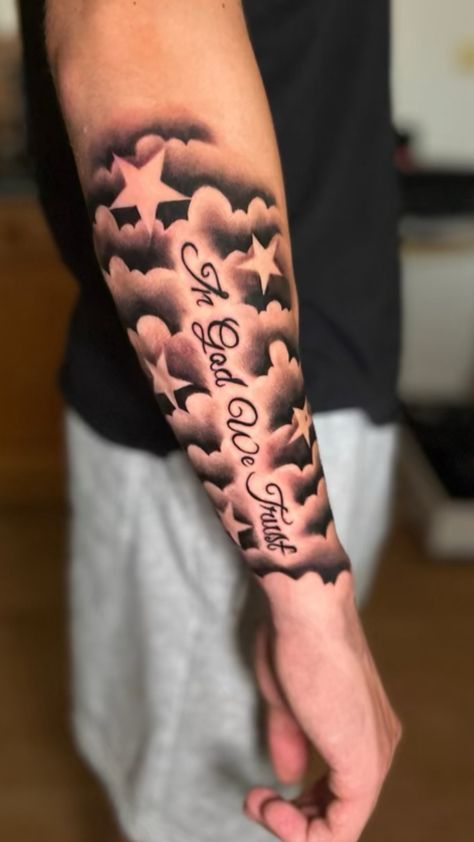 Men’s forearm tattoo with clouds and stars Name And Clouds Tattoo, Tattoo For Lost Loved One For Men, Clouds Tattoo Forearm, Half Sleeve Cloud Tattoos For Men, Clouds Around Name Tattoo, Cloud Tattoo Cover Up, Forearm Tattoo Men Name, Cover Up Shoulder Tattoo Men, Clouds With Stars Tattoo