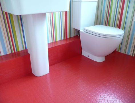 Bathroom with red rubber flooring Rubber Flooring Bathroom, Dark Kitchen Floors, Best Bathroom Flooring, Rubber Floor Tiles, Floor Tiles Design, Flooring Texture, Alternative Flooring, Rubber Tiles, Tiles Design