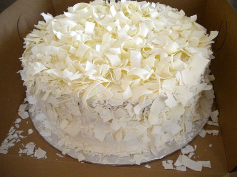 White chocolate shavings White Chocolate Shavings Cake, White Chocolate Shavings, Cake With White Chocolate, White Chocolate Bark, White Cake Recipe, Wedding Brunch, Chocolate Wedding Cake, Wedding Cakes With Flowers, Chocolate Bark