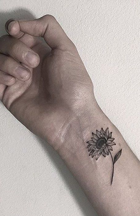 23 Unique Wrist Tattoos for Men in 2021 - The Trend Spotter Sunflower Tattoo On Wrist, Small Flower Tattoo, Sunflower Tattoo Meaning, Sunflower Tattoo Thigh, Sunflower Tattoo Simple, Tattoo Sunflower, Tattoo Homme, Small Rib Tattoos, Flor Tattoo