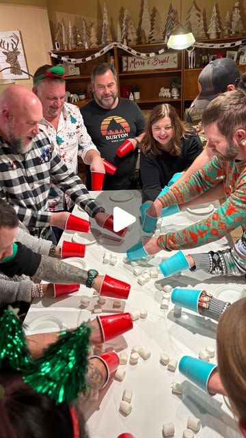 Heather Painchaud on Instagram: "SAVE THIS post - these 10 minute to win it Christmas games were a huge hit at our annual Elf party last night!   Comment “elf” and I’ll send you more holiday party ideas and free printables or find them here https://homemadeheather.com/elf-holiday-party-ideas/  THE GAMES:  Icebreaker - each person gets three clothes pins.  If you hear someone say the “forbidden word” you get to steal their pin.  Most pins wins - word was “christmas”.  GAME ONE - stack solo cups with chopsticks (relay)  Chop sticks (4) Solo cups (20)  Fastest team wins.  GAME TWO - blow snowballs from top of solo cups (relay)  Solo cups (20) Blowers (1 for each player) Cotton balls (20)  Fastest team wins.  GAME THREE - fill the cup (but don’t overflow)  Clear cup/vase Red solo cups   Teams Silent Ball Game, Fun Winter Games For Adults, Party Cup Games, In It To Win It Games, Solo Cup Christmas Tree Punch Game, Solo Cup Christmas Game, Holiday Group Games, Red Solo Cup Games, Cotton Ball Game