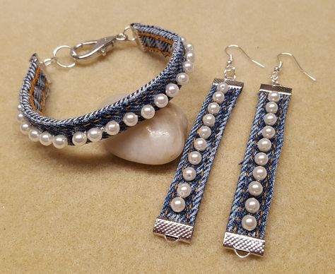 Denim seams and pearls. Blue Jean Bracelets, Recycled Denim Jewelry, Denim Recycling Ideas, Jean Upcycle Diy Clothes, Beaded Jeans Diy, Denim Accessories Diy, Denim Earrings Diy, Denim Jewelry Diy, Cloth Jewellery Handmade