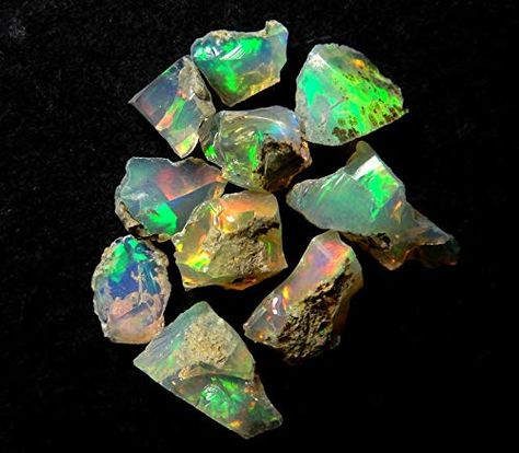 PRICES MAY VARY. Mined - These beautiful fire play raw opals are directly mined from Ethiopia Opal - The name Opal is derived from the Latin opalus and the Sanskrit upala, meaning precious stone. Healing - Encourages both freedom and independence. Opal enhances cosmic consciousness and induces psychic and mystical visions. It stimulates originality and creativity. Helps to release anger and claim self worth, aiding in accessing and expressing one's true self. Metaphysical - Opal has a generally Dragons Breath Fire Opal, Opal Rock, Raw Crystals, Meditation Art, Reiki Crystals, Raw Opal, Rock Jewelry, Rare Crystal, Opal Color