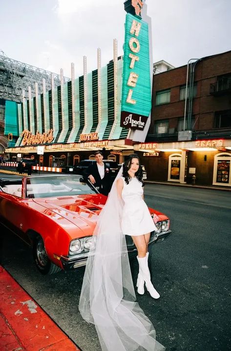 Timber & Austin eloped at the Little White Wedding Chapel in Las Vegas, captured by las vegas elopement photographers brazen honey films. Short wedding dress inspo, kitsch elopement vibes, neon lights, vintage wedding car, convertible classic car for wedding photos. Best vegas elopement inspiration! Classy Las Vegas Wedding, Downtown Vegas Wedding Photos, Vegas Lesbian Wedding, Vintage Vegas Wedding Dress, 70s Vegas Wedding, Classy Vegas Elopement, Vintage Las Vegas Wedding, Vintage Vegas Elopement, Old Vegas Wedding