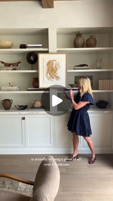 Studio McGee on Instagram: "One of my favorite styling tips for displaying art is to hang a piece over a built-in. It feels like you're breaking a rule, but it always leads to a beautiful result. #SMHoustonEstate" Mcgee And Co Shelves, Studio Mcgee Built Ins, Studio Mcgee Shelf Styling, Built In Styling, Mcgee And Co, Shea Mcgee, Studio Mcgee, Shelf Styling, Wood Work