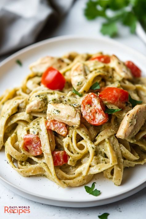 Creamy Chicken Pesto Pasta is a quick and easy dinner recipe combining tender chicken, al dente pasta, and a rich, velvety basil pesto sauce. Quick Pesto Pasta, Basil Pesto Chicken Pasta, Creamy Pesto Pasta Recipe, Creamy Chicken Pesto Pasta, Chicken Basil Pasta, Pesto Pasta Recipes Chicken, Basil Pesto Chicken, Basil Pesto Recipe, Chicken Pesto Pasta