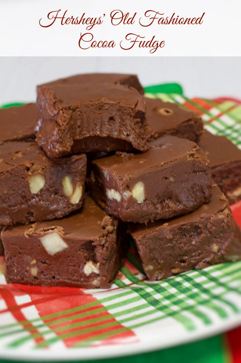 Pieces of Hershey's old fashioned cocoa fudge with nuts on a red and green Christmas plate. Hershey Chocolate Recipes, Old Fashioned Hershey Cocoa Fudge, Hersheys Cocoa Fudge Recipe, Chocolate Fudge With Cocoa Powder, Original Hershey Cocoa Fudge Recipe, Cocoa Powder Fudge, Cocoa Powder Fudge Recipe, Chocolate Fudge Recipes, Hersheys Cocoa Fudge