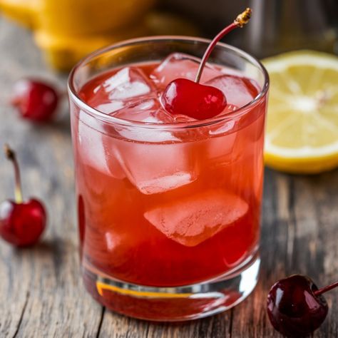 Looking for a refreshing and tasty cocktail to impress your friends? The Cherry Amaretto Sour is a perfect choice! 🍒 Made with a mix of sweet and tangy flavors, it's a crowd-pleaser at any gathering. This Frozen Amaretto Sour, Maraschino Cherry Cocktail, Cherry Amaretto Sour, Amaretto Cherries, Cherry Cocktails, Amaretto Drinks Recipes, Amaretto Sour Recipe, Amaretto Drinks, Amaretto Sour Cocktail