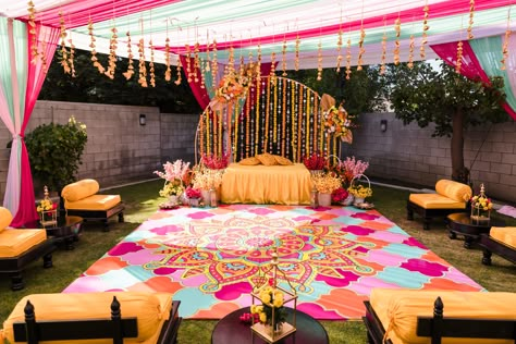 Nital & Vishal's Whimsical Garden Wedding In California Haldi Dance Floor Flex Design, Sangeet Floor Decor, Colorful Haldi Decor, Backyard Haldi Decor, Haldi Dance Floor, Carnival Haldi Decor, Ladies Sangeet Decoration, Haldi Carnival Decor, Mehndi Dance Floor