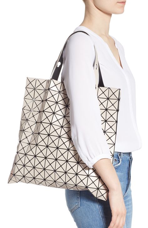 A prismatic array of glossy triangles atop flexible mesh transforms this lightweight tote into a unique work of art as it takes the shape of objects inside. The handles adjust for hand or over-the-shoulder carry, while the fluid design allows for easy packing and flat storage when not in use. Style Name:Bao Bao Issey Miyake Prism Tote. Style Number: 5632811. Tutus, Bao Bao Bag, Issey Miyake Bao Bao, Issey Miyake Bag, Prism Pattern, Flat Storage, Issey Miyake Women, Bao Bao Issey Miyake, Bao Bao