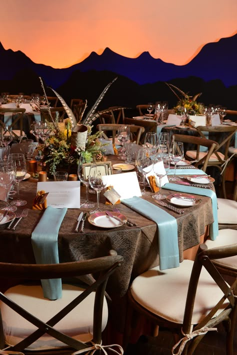 Western decor and theme set against a mountain sunset at the Denver Art Museum. Beautiful! Western Table Decorations, Country Western Parties, Country Western Decor, Gala Decorations, Cowboy Theme Party, Gala Themes, Gala Ideas, Fundraising Gala, Western Theme Party