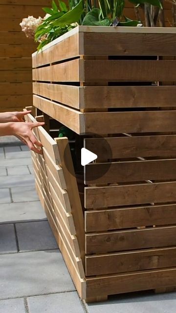 617K views · 11K likes | Marie | DIY Montreal on Instagram: "Adding hidden storage underneath my planter 🌱   Didn't want any visible hinges or anything to affect the look, so went with magnets!  Full video and plans 👉 link in profile   #pullsaw #magnets #neodymium #planterbox #planter #hiddenstorage #outdoordiy #woodworker #diywoodwork" Covering Outdoor Electrical Boxes, Package Hiding Planter, Planter With Storage, Planter Boxes Around Deck, Planter Boxes Diy, Diy Planter Boxes, Wooden Planter Boxes Diy, Diy Montreal, Hidden Shelf