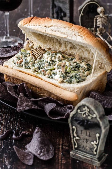 Halloween Spinach Dip Coffin, Halloween Spinach Artichoke Dip, Spinach Artichoke Dip Halloween, Bread Coffin For Dip, Coffin Spinach Dip, Halloween Artichoke Dip, Halloween Spinach Dip Ideas, Coffin Bread Bowl, Halloween Bread Bowl