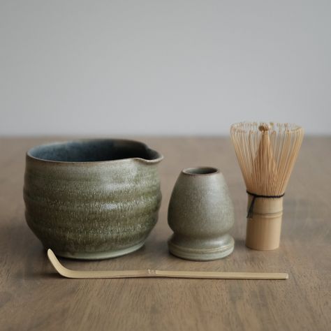 Currently made to order status. 3 to 4 weeks delivery, but if it's in stock it will ship out immediately.  Proudly crafted in Canada with care and craftsmanship. The full Ceremonial Matcha tea set is comprised of a Small Matcha Jar, matcha bowl, one tea cup, handmade whisk holder, high quality bamboo whisk and bamboo matcha spoon. You have the option of adding additional tea cups. Please DM if you would like anything custom added to your order. Matcha Bowl measures roughly 5" wide by 3.5" tall. Matcha Making Set Up, Matcha Pottery Set, Matcha Mixing Bowl, Matcha Whisk Set, Matcha Set Ceramics, Matcha Set Aesthetic, Matcha Whisk Holder, Ceramic Matcha Set, Matcha Bowl Pottery