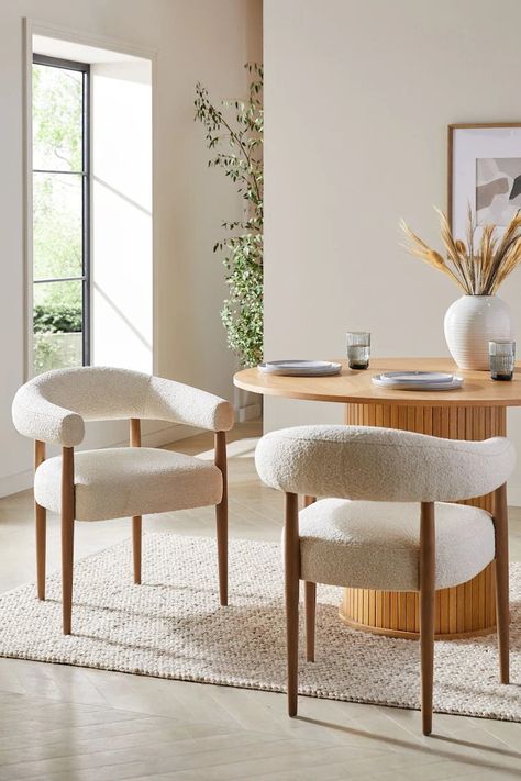 Buy Set of 2 Casual Boucle Oyster Aire Light Wood Leg Dining Chairs from the Next UK online shop Cosy Dining Table, Round Table Decor Kitchen, Round Dining Table Chairs, Kitchen Dining Area Ideas, Boucle Chair Dining, Kitchen Sitting Area Ideas, Round Dining Table With Chairs, Dining Set Ideas, Round Table With Chairs