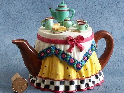 Teapot Table, Skirted Table, Novelty Teapots, Teapots Unique, Unique Tea, Mary Engelbreit, Coffee Pots, Chocolate Tea, Teapots And Cups