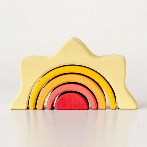 handcrafted in Russia by a third-generation toymaker family, the heirloom quality is one that will be cherished for years and makes a perfect present. dimensions: 5 nesting pieces; largest measures 5.1in x 3in x 1.6in (13cm x 7.5cm x 4cm) shop our collection of wooden toys HERE Material + Care handmade with solid wood Wooden Sun, Wooden Arch, Open Ended Toys, Toy Maker, Water Based Stain, Creative Games, Fancy Houses, Wood Patterns, Wood Toys