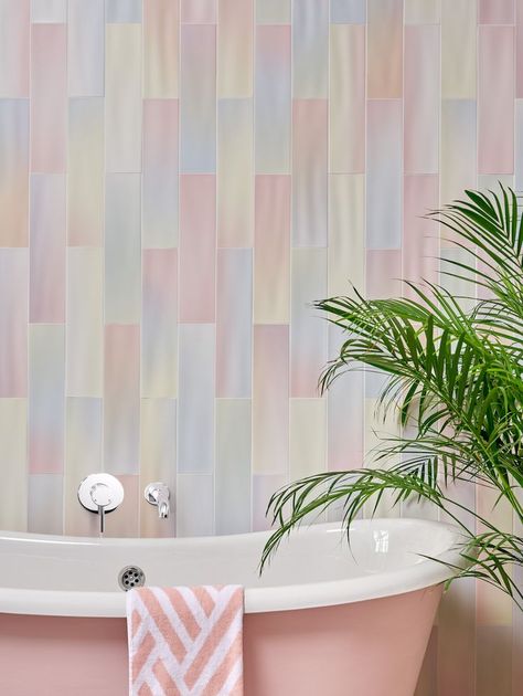 Pink bathtub in front of a wall tiled with pastel tiles. Rainbow inspired theme Latest Bathroom Trends, Pastel Bathroom, Art Deco Style Interior, Rainbow Tile, Ceramic Floor Tiles, Childhood Nostalgia, Bathroom Trends, Pink Bathroom, Wall And Floor Tiles