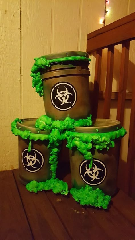 Zombie Theme Decorations, Alien Yard Decorations, Zombie Diy Decorations, Alien Halloween Party, Toxic Waste Halloween Decorations, Mad Scientist Halloween Decorations, Zombie Outfit Halloween, Mad Scientist Trunk Or Treat, Halloween Buckets Ideas