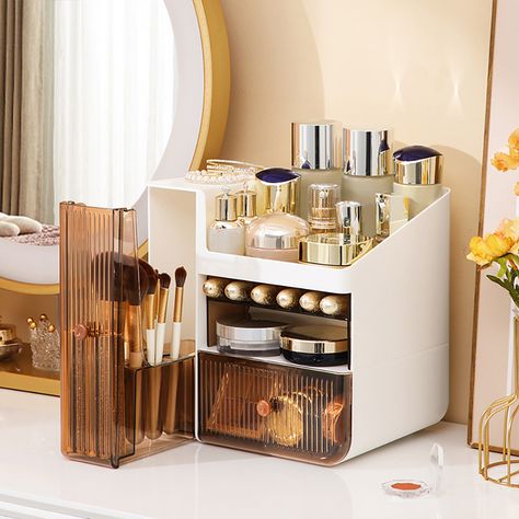 The makeup organizer box and the drawer are detachable. This cosmetics organizer with open stores your high-bottled large-bottle water emulsion, cosmetics, perfumes, and other skincare items in various shapes and sizes neatly. 2 large drawers for your facial brush or small items.