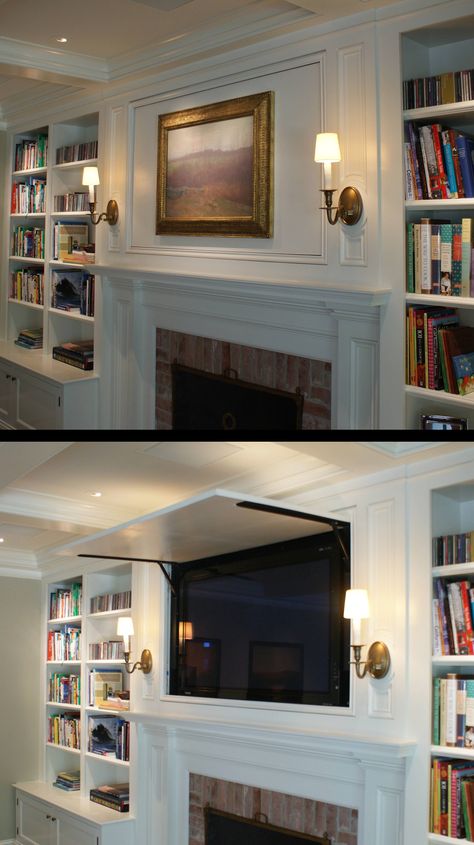 Tv Cabinet Over Fireplace Hide Tv, Covered Tv Over Fireplace, Hidden Tv Over Fireplace Ideas, Hidden Tv Over Mantle, Tv In Bookcase Beside Fireplace, Hidden Tv In Bookcase, Lighting Over Fireplace Mantles, Moulding On Tv Wall, Fireplace Tv Cover