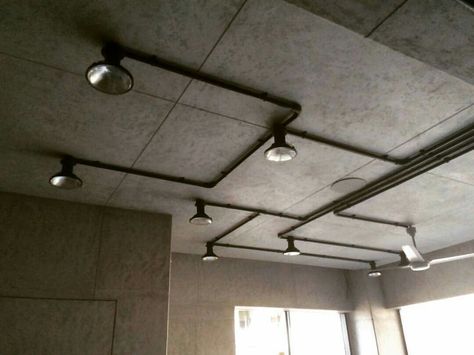 Conduit Lighting Ceilings, Exposed Wiring Interior Design, Exposed Conduit Lighting, Exposed Electrical Conduit Ideas, Pipe Lighting Ceiling, Clothes Rack Design, Conduit Lighting, Front Porch Lighting, Galvanized Light