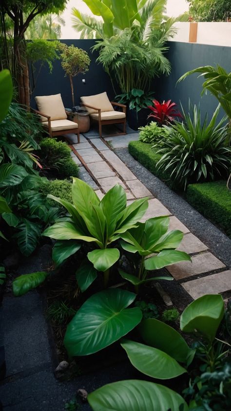 Transform your backyard with stunning small tropical garden ideas Discover design ideas for landscaping UK patio ideas Australian front yard inspiration backyard design full sun plants and New Zealand bed ideas Explore creative small tropical garden ideas to elevate your outdoor space Mini Tropical Garden, Tropical Garden Bed, Small Tropical Garden Ideas, French Terrace, Front Yard Inspiration, Tropical Garden Ideas, Small Tropical Gardens, Yard Inspiration, Small Garden Landscape