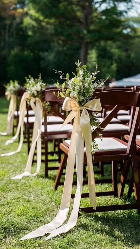 18 Wedding Aisle Decoration Ideas For Your Special Day Cheap Aisle Decor, Ceremony Aisle Chair Decor, Potted Plants Down Wedding Aisle, Bows On Chairs Wedding Ceremony, Indoor Wedding Isles Decoration, Bow Aisle Markers, Aisle Doors Wedding Entrance, Simple Aisle Flowers Wedding, Aisle Design Wedding