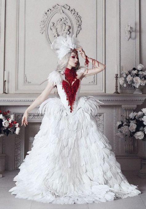 From costume chic to goth glam: these Halloween wedding dresses are spooktacular | Offbeat Bride Halloween Wedding Dresses, Braut Halloween, Vampire Wedding, Kostum Halloween, Kostuum Halloween, Gothic Party, Feather Gown, Swan Dress, Goth Wedding